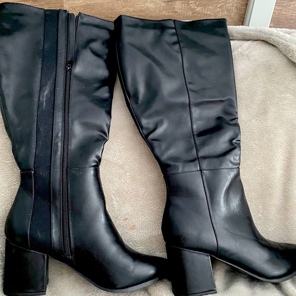Tall black boots
